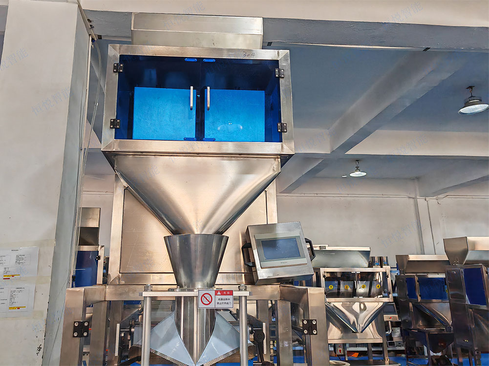 大米自动称重包装机主要由称重系统、给料系统、包装系统和控制系统等组成